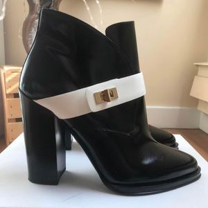 Black Hugo Boss leather boots with white strap detail, size 10US.
